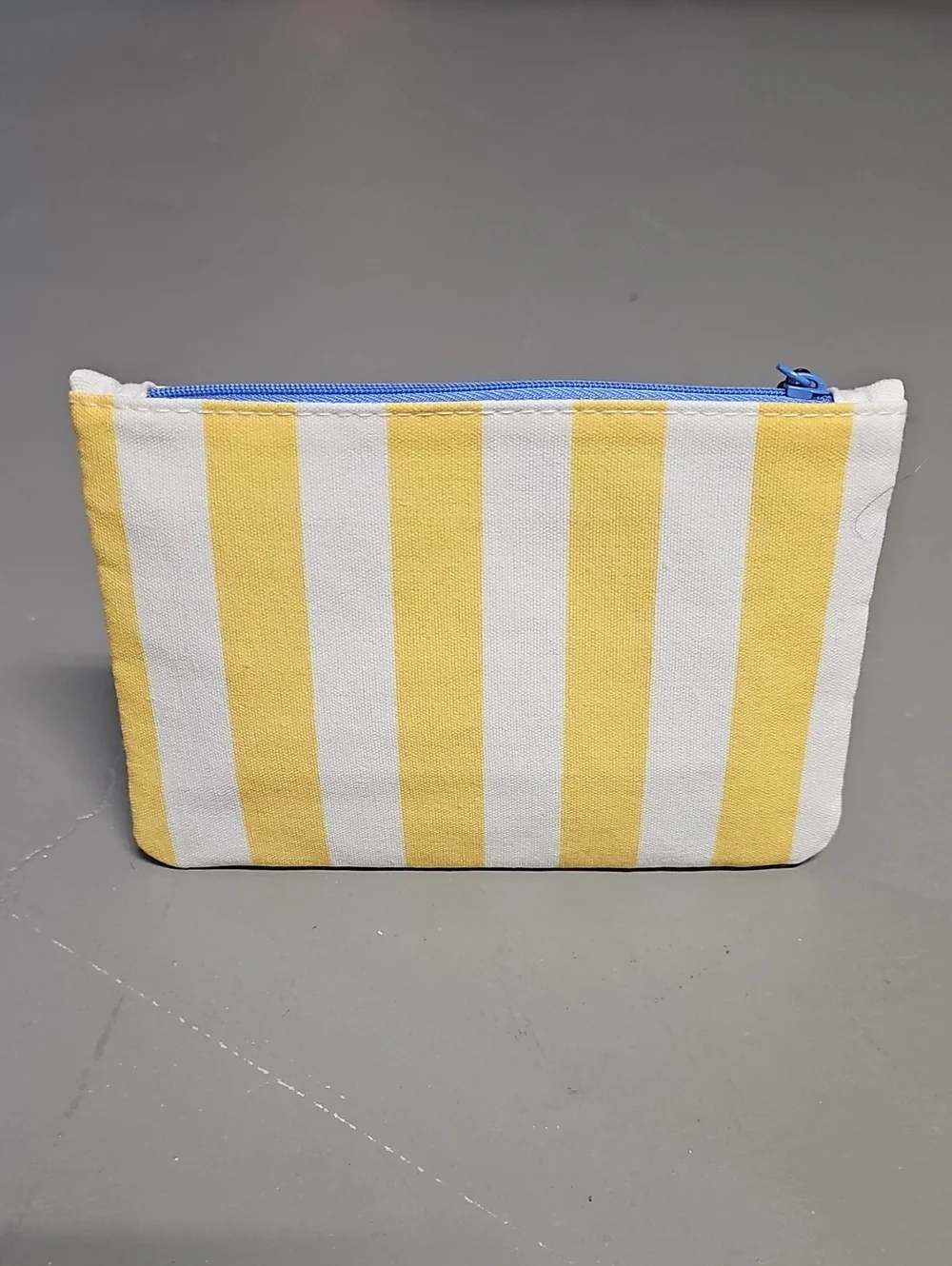 IPSY Glam Bag July 2026 Yellow & White Stripes Beach Theme